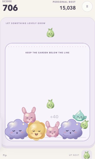 Orbuddle game board with a garden of merged creatures and a saved score